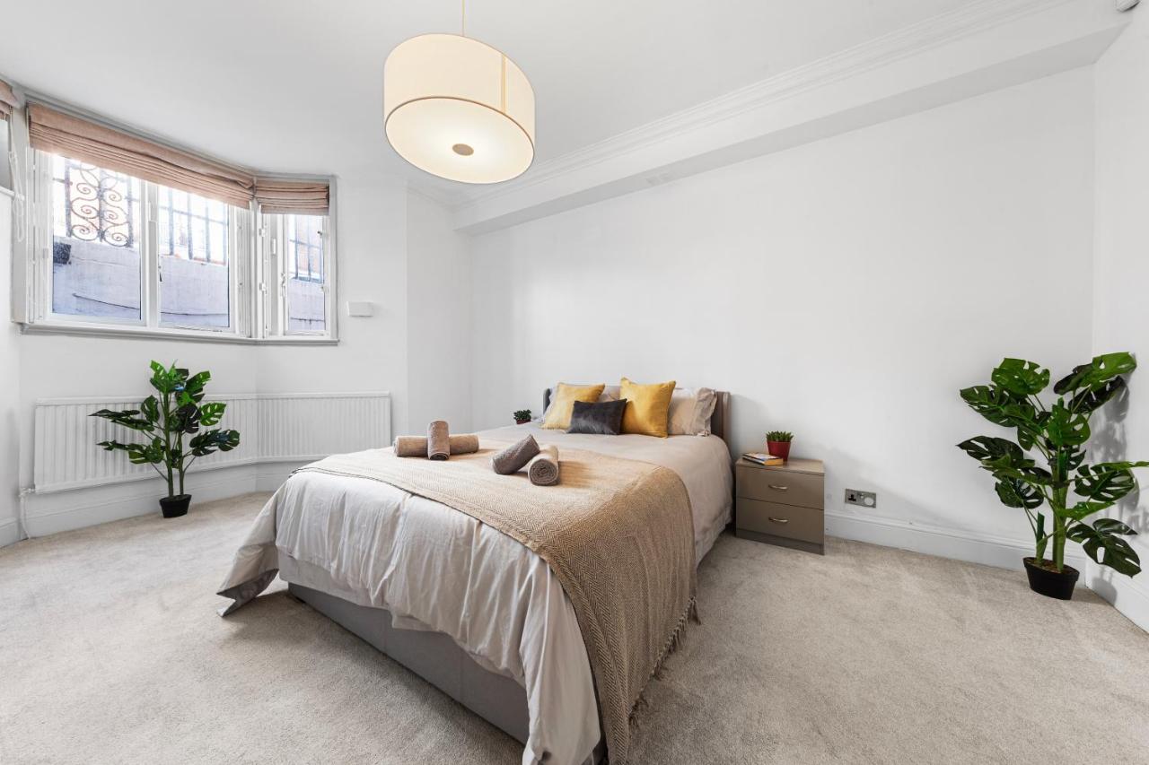 Apartamento Harrods 2 Bed Lux Flat W/Patio Londres Exterior foto